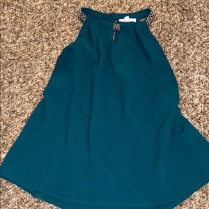 Cute Top with rhinestone detail around the neck